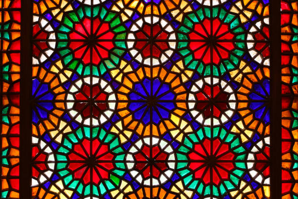 istock Beautiful colorful stained glass window patterns in Yazd, Iran 1127304302