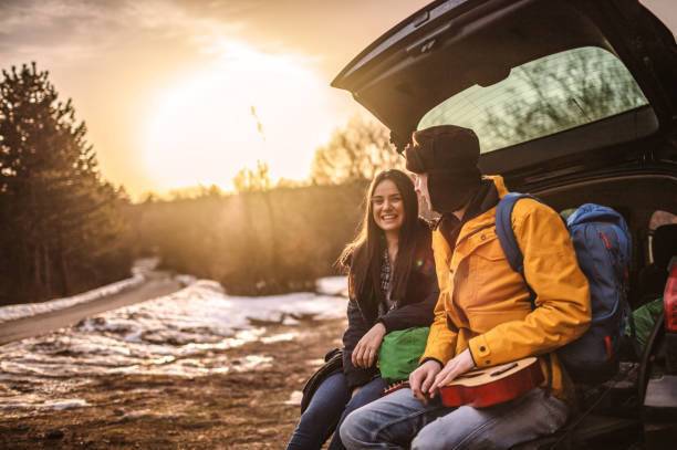 istock Yong couple in car trunk 1127305053