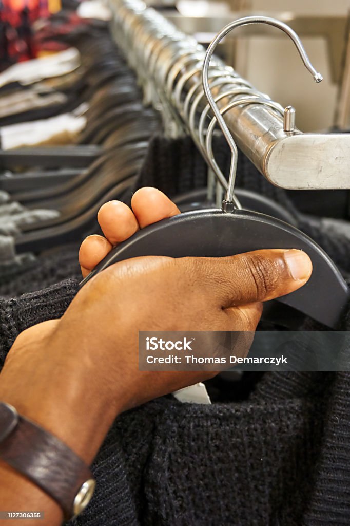 Cloth Clothes off the rack Black Color Stock Photo