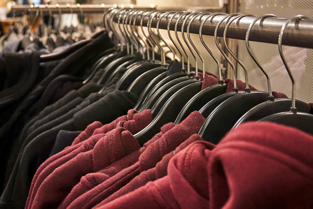 Cloth Clothes off the rack oberteil stock pictures, royalty-free photos & images