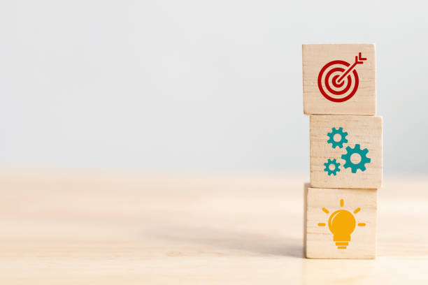 istock Concept of business strategy and action plan. Wood cube block stacking with icon 1127307386