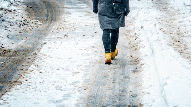 istock Winter Walk in Yellow Leather Boots 1127307522