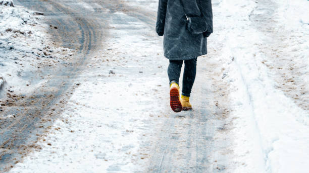 istock Winter Walk in Yellow Leather Boots 1127307557