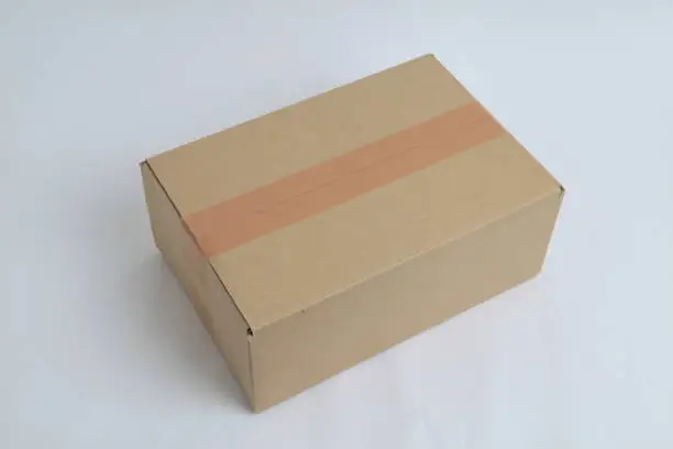 brown color closed corrugated cardboard box picture