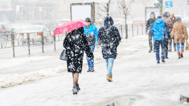 istock Blizzard in an urban environment. Rush Crowd 1127309181