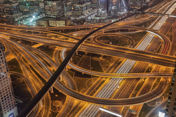 istock Dubai with highways at night in United Arab Emirates 1127309548