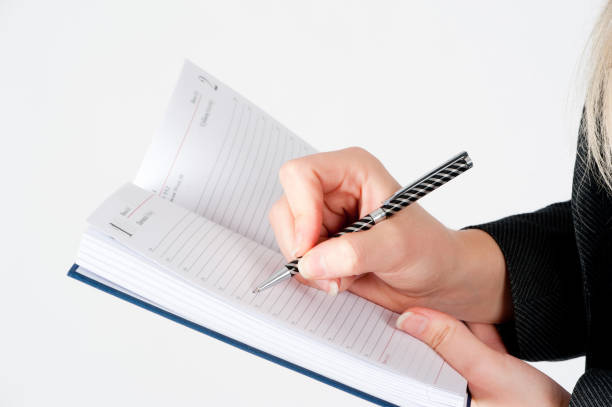 istock Hads of business lady with organizer 1127311016