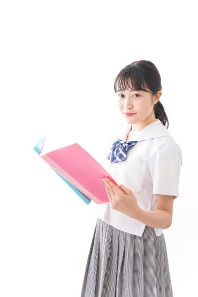 istock Pretty smiling teenager studying 1127311183