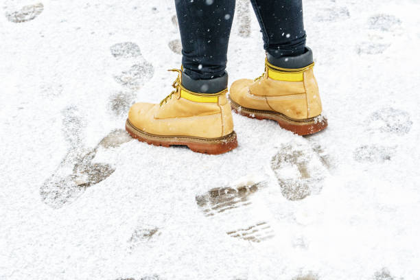 istock Winter Walk in Yellow Leather Boots 1127311701
