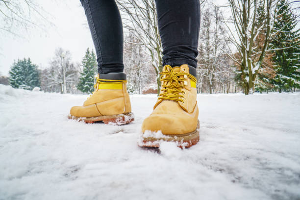istock Winter Walk in Yellow Leather Boots 1127312685
