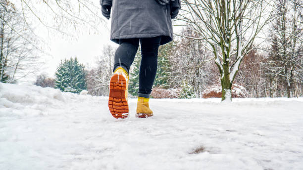 istock Winter Walk in Yellow Leather Boots 1127312796