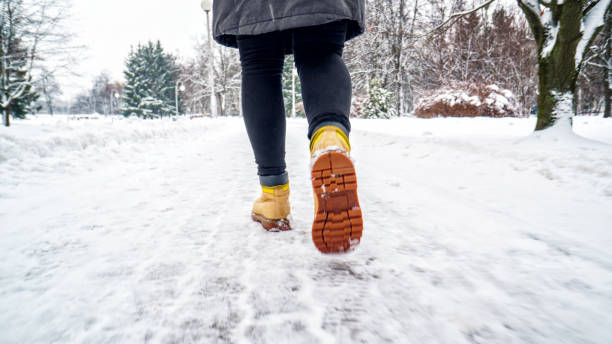istock Winter Walk in Yellow Leather Boots 1127312836