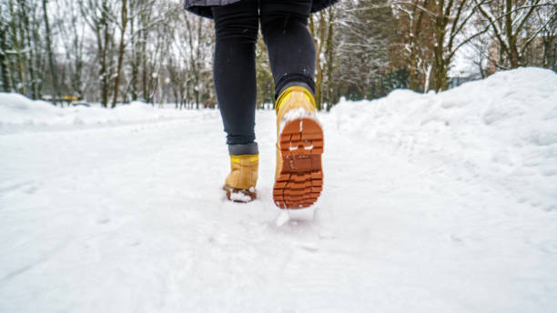 istock Winter Walk in Yellow Leather Boots 1127312862