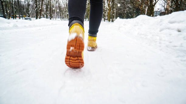 istock Winter Walk in Yellow Leather Boots 1127312878