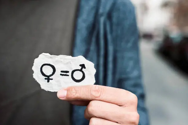 Photo of gender equality in a piece of paper