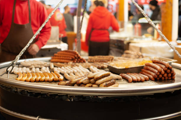 istock Sausages on grill at Evening christmas market 1127314864