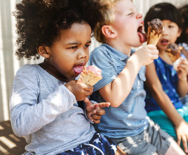 istock Kids eating ice cream in the summer 1127316588