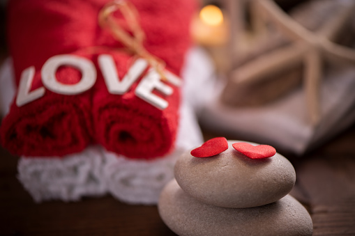 Wellness docoration on valentine's day with towels and stones. Love Concept