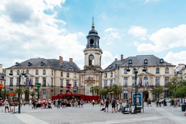 City Hall Plaza of Rennes with people enjoying music Rennes, France - July 23, 2018: City Hall Plaza or Place de la Mairie with people enjoying music rennes france photos stock pictures, royalty-free photos & images