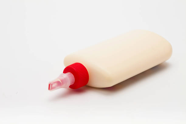 istock Wood Glue Bottle with Spreader Cap on a white background 1127320446