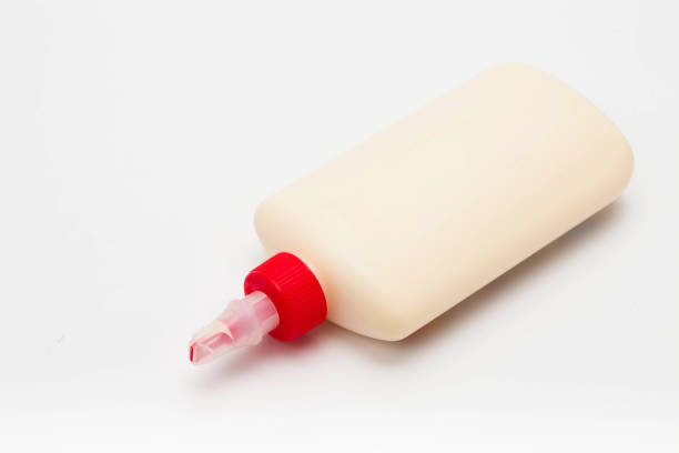 istock Wood Glue Bottle with Spreader Cap on a white background 1127320455