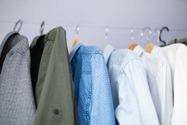 istock Men's shirts collection on hangers 1127321537