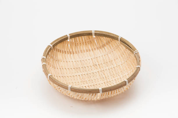 istock Bamboo traditional asian kitchen basket food tool isolated on white 1127322939