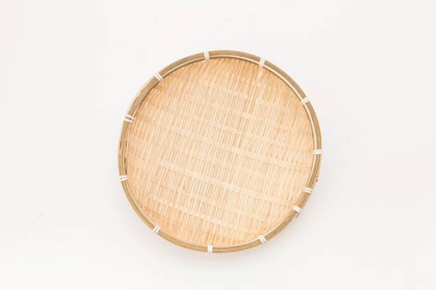 Bamboo traditional asian kitchen basket food tool isolated on white