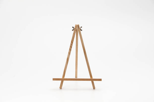 istock Small wooden easel on a white background 1127323253