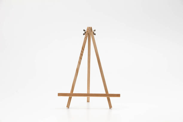 istock Small wooden easel on a white background 1127323256