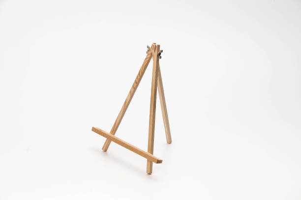 istock Small wooden easel on a white background 1127323259