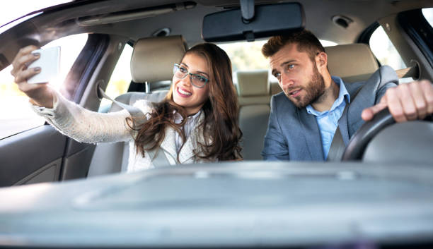 istock Driving and looking at the mobile phone 1127323827