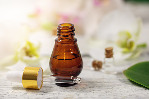 organic herbal essential oil bottle and dropper