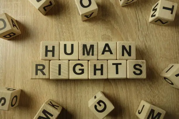 Photo of Human rights text from wooden blocks
