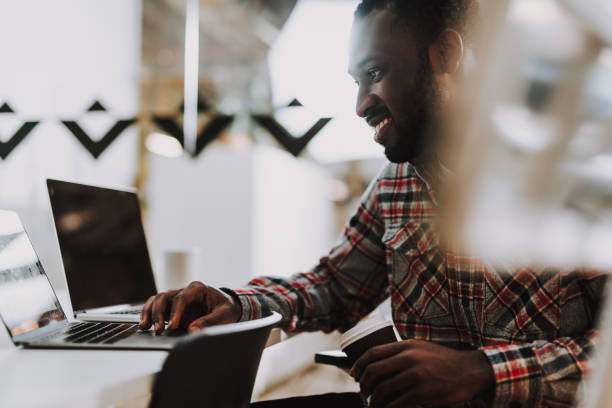 istock Cheerful bearded Afro-American man smiling and looking happy 1127326983