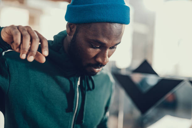 istock Close up of attractive Afro-American man standing alone 1127327053