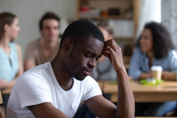istock Sad African American man suffering from bullying or racial discrimination 1127327150