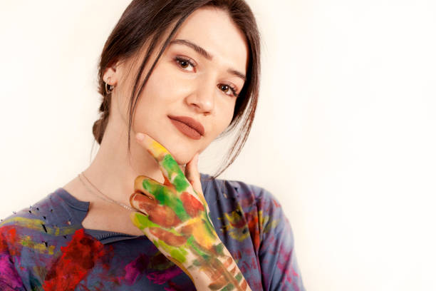 istock beautiful artist woman painter 1127329303