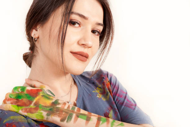 istock beautiful artist woman painter 1127329919
