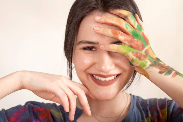 istock beautiful artist woman painter 1127330018