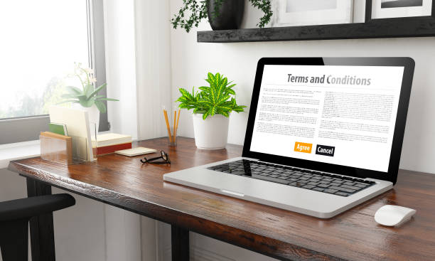 istock laptop at home office terms and conditions 1127330573