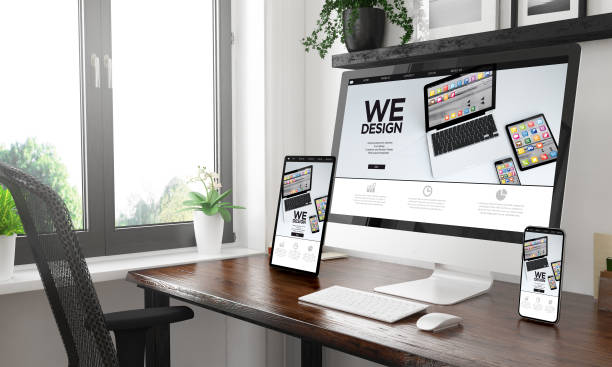 istock black and white desktop with three devices showing app designers website 1127330616