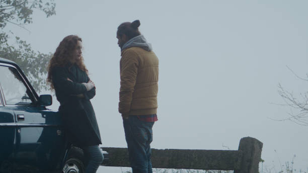 Couple having a relationship crisis on a road trip