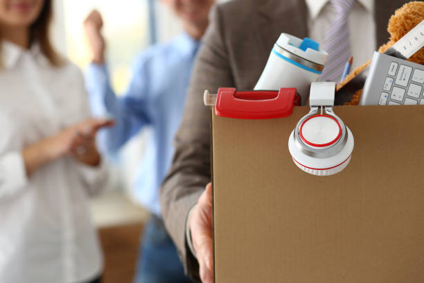 istock Male worker with stuff hold box closeup 1127333118