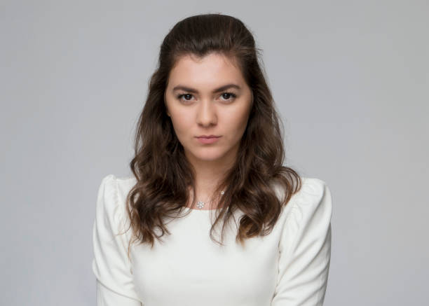 istock Portrait of angry young female 1127336299
