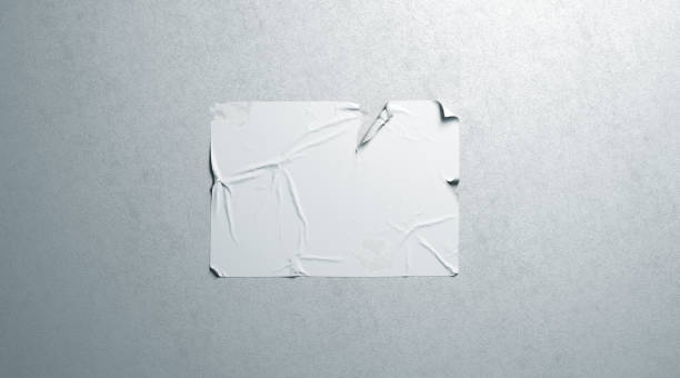 istock Blank white wheatpaste adhesive tear poster mockup on textured wall 1127336842