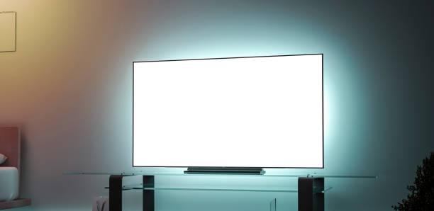 istock Blank white large tv screen interior in darkness mockup 1127337818