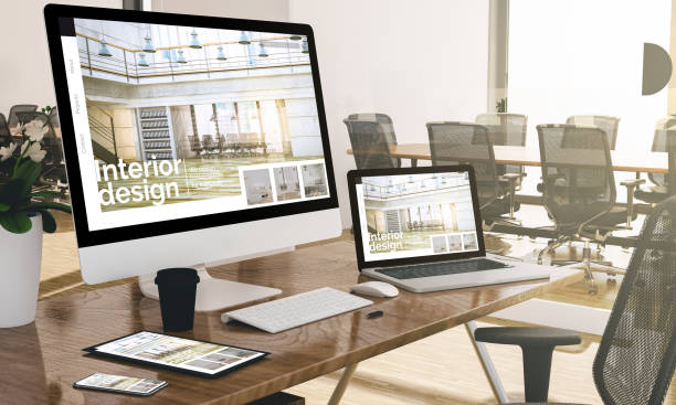 istock computer, laptop, tablet, and phone with interior design website at office mockup 1127338442