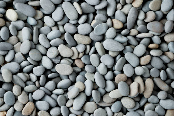 istock Abstract background texture sea stones, top view 1127341480