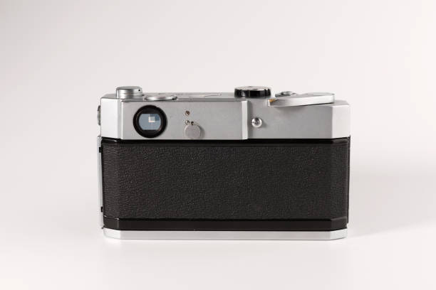 istock Old photo camera isolated on white background, back view 1127341500